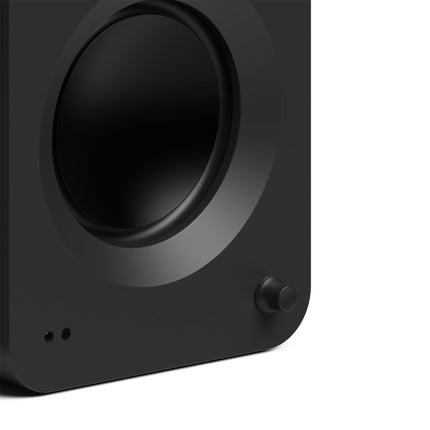 Kanto Audio REN powered speakers in black, volume knob and woofer detail