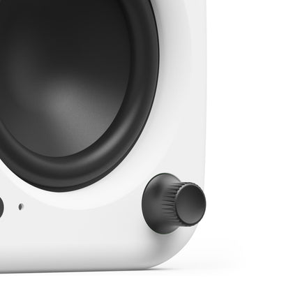 Boxe active Kanto Audio UKI White, detaliu cu butonul de volum și mufa de căști
